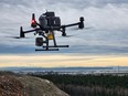 A drone flies over Kelowna, B.C., in this undated handout image provide by the City of Kelowna. Drones and robots are being put to work in the orchards of Kelowna as part of a pilot project designed to promote what the equipment maker calls "precision farming."