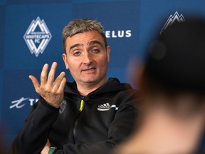 Vancouver Whitecaps coach Vanni Sartini has got a reprieve from Major League Soccer.&ampnbsp;Sartini speaks during an end-of-season news conference in Vancouver, B.C., Tuesday, Nov. 7, 2023.