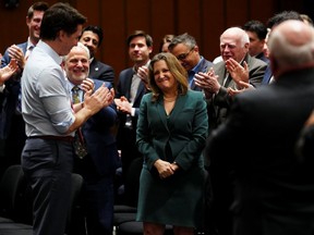 Minister of Finance Chrystia Freeland is applauded during an April 17 caucus meeting.