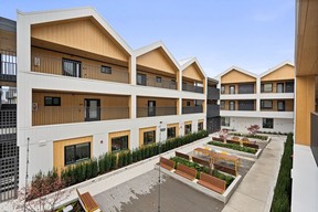 The courtyard at the District Flats development in Southlands community features gardening spaces.