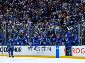The Vancouver Canucks celebrate a 4-2 win over the Nashville Predators in Game One of the First Round of the 2024 Stanley Cup Playoffs