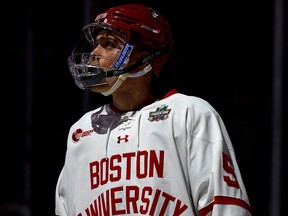 Tom Willander of the Boston University Terriers looks on prior to the start of the game against the Denver Pioneers during the NCAA Men's Hockey Frozen Four semifinal at Xcel Energy Center on April 11, 2024 in St Paul, Minnesota.