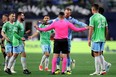 Jackson Ragen #25 of Seattle Sounders reacts as he is issued a red card against the Vancouver Whitecaps during the first half at Lumen Field on April 20, 2024 in Seattle, Washington.