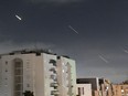 Israel's Iron Dome air defence system intercepts missiles fired from Iran, in central Israel, on April 14.