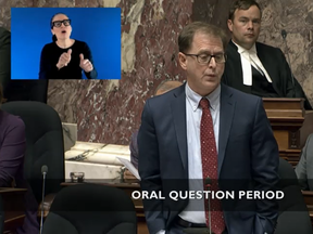 B.C. health minister Adrian Dix rises in the B.C. Legislative Assembly to respond to a leaked memo in which hospital workers were told not to confiscate weapons or illicit drugs from patients.