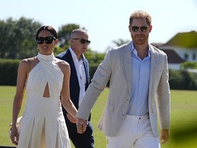 Prince Harry and his wife Meghan Markle, Duchess of Sussex, arrive for polo charity event in Wellington, Florida, April 12, 2024.