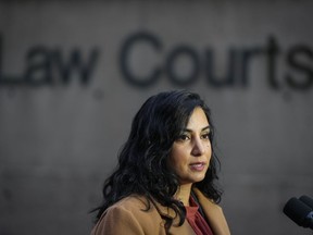 B.C. Attorney General Niki Sharma responds to questions outside B.C. Supreme Court in Vancouver on Monday November 27, 2023. British Columbia has introduced legislation the attorney general says is designed to hold ministries accountable for addressing systemic racism in government policy and programs.
