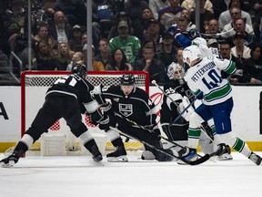 Vancouver Canucks' Elias Pettersson scores against the Kings in Los Angeles.