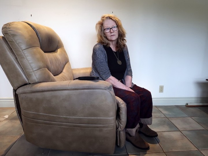  Sara Bennett Fox on her father’s recliner at home in Bowen Island. Her father, Jonathan Francis Bennett, died at home by MAID last week.