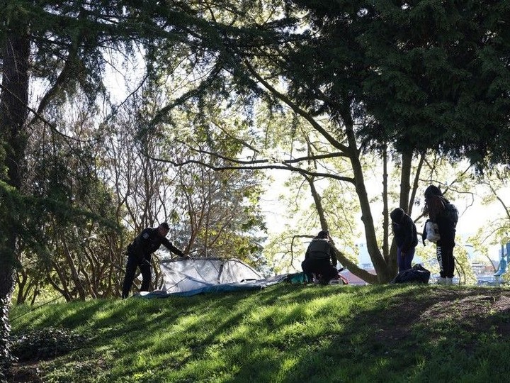  Campers belonging are removed at CRAB Park as the city enforces bylaw compliance in Vancouver April 18, 2024.