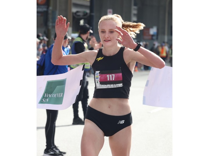  Glynis Sim of Vancouver is the first woman to cross the finish line in the 2024 Vancouver Sun Run with a time of 32 min , 17 sec in Vancouver, B.C., on April 21, 2024.
