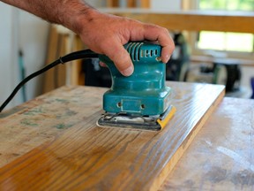 Sanding lightly between coats of urethane is key to a smooth finish on interior wood.