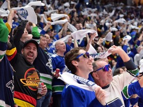Vancouver Canucks fans cheer during the second period against the Edmonton Oilers in Game Two of the Second Round of the 2024 Stanley Cup Playoffs at Rogers Arena on May 10, 2024 in Vancouver, British Columbia.