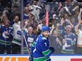 Vancouver Canucks' Carson Soucy celebrates his goal against the Edmonton Oilers during the first period in Game 5 of an NHL hockey Stanley Cup second-round playoff series, in Vancouver, on Thursday, May 16, 2024.