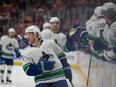 Brock Boeser takes a celebration stroll after scoring one of his two goals against the Oilers in Game 4 of the playoff series on May 12 in Edmonton.