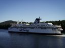 The BC Ferries vessel Spirit of Vancouver Island passes between Mayne Island and Galiano Island while travelling from Swartz Bay to Tsawwassen, B.C., Wednesday, Sept. 20, 2023.