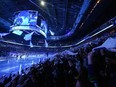 Fans wave towels before the Vancouver Canucks and Nashville Predators play Game 1 of an NHL hockey Stanley Cup first-round playoff series in Vancouver on Sunday, April 21, 2024.