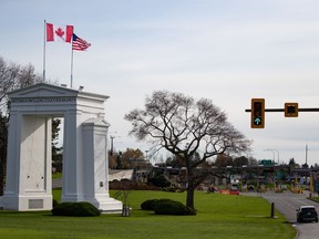 Motorists wait at U.S. Customs and Border Protection inspection booths at the Peace Arch border crossing in Blaine, Wash., across the Canada-U.S. border from Surrey, B.C., on Monday, November 8, 2021. A U.S. crackdown on foot crossings is taking place at Peace Arch Park, the unfenced park that straddles the border, in response to the increased operations of what U.S. Customs and Border Protection called "transnational criminal organizations."