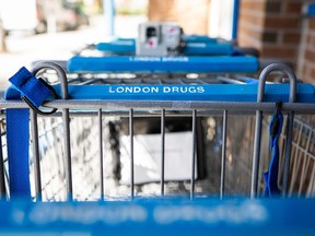 Retailer London Drugs says it is rebuilding its infrastructure with the help of leading third-party cybersecurity experts to bring its operations safely back online. Shopping carts are seen outside of the London Drugs Kerrisdale location on Monday, April. 29, 2024.