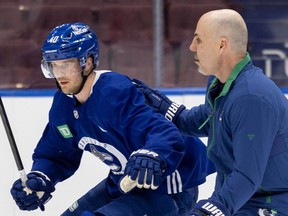 Vancouver Canuck Elias Pettersson with coach Rick Tocchet. Pettersson is struggling in the second playoff round against the Oilers.