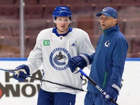 Sam Lafferty with Assistant Coach Mike Yeo during Vpractice at Rogers Arena in October 2023