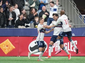 As the Vancouver Whitecaps celebrate a half-century of soccer history, Brian White has carved out a spot in the club's record book. White celebrates his goal with teammates Ryan Gauld, left, and Fafa Picault during first half MLS soccer action against Toronto FC, in Vancouver, B.C., Saturday, April 6, 2024.