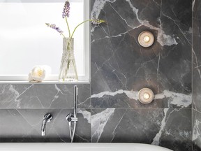 Designer lighting is becoming a trend in bathroom design.