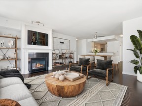 The interior has been freshly painted and offers stainless-steel kitchen appliances, hardwood floors, and a gas fireplace.