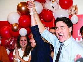 Leslie Church, Liberal candidate for Toronto-St. Paul's, and Prime Minister Justin Trudeau speak to supporters at a campaign volunteer event in Toronto on May 30, 2024.