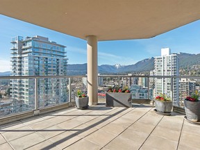 This Central Lonsdale sub-penthouse is one of four units on this floor with a north-west-facing corner location with far-reaching ocean and mountain views.