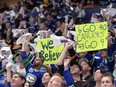 Canucks fans cheer during the first period against the Edmonton Oilers in Game 2 of the Second Round of the 2024 Stanley Cup Playoffs at Rogers Arena on May 10, 2024.