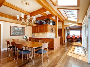 Built in 1977, the North Delta house boasts a post-and-beam construction with wood-clad vaulted and coffered ceilings, skylights, hardwood floors and two fireplaces.