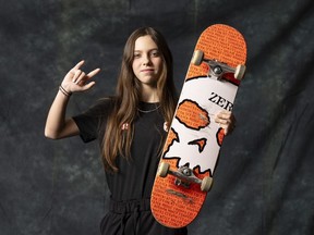 Fourteen-year-old Fay De Fazio Ebert has been named to Canada's skateboard team for the Paris Olympics. De Fazio Ebert poses during media day organized by the Canadian Olympic Committee in Montreal, Thursday, Dec. 14, 2023.