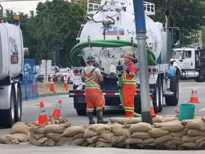 Workers continue to clean up Monday after last week's sewage leaks