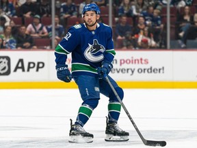 Canucks prospect Jett Woo is coming of a career AHL season in Abbotsford and was rewarded with a one-year, two-way contract Sunday.