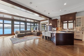 view of kitchen and living room with ocean view