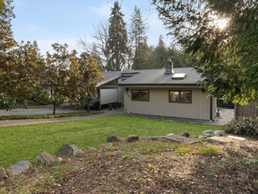 This mid-century modern home was designed by renowned Vancouver architect Kenneth McKinley and resides in a cul-de-sac setting in Vancouver's Southlands neighbourhood.