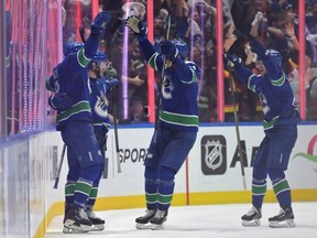 J.T. Miller of the Vancouver Canucks celebrates the game-winning goal against the Edmonton Oilers during the third period in Game Five of the Second Round of the 2024 Stanley Cup Playoffs at Rogers Arena on May 16, 2024.