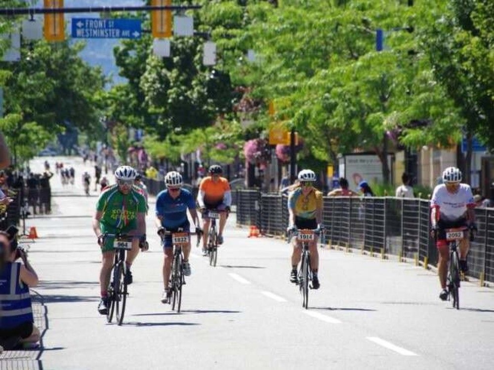 Riders reach the finish line of Sunday's 12th annual Okanagan Granfondo on Main Street in Penticton. Photo: Barb Aguiar