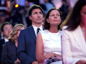 Prime Minister Justin Trudeau sits in the audience before U.S. President Joe Biden delivers remarks at a NATO summit in Washington on July 9, 2024.