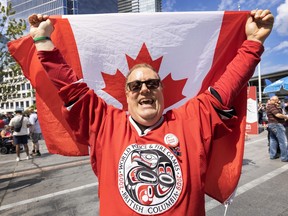 Leslie Benisz with Canadian flag