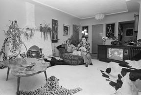 Competition runner-ups Mrs. C. Nevard and son Ken Coburn went big on the bling in their Balsam Street rental apartment. Treatments like a crushed velvet wall covering, an overhead dining room canopy and a decorative fireplace facade added high style — yet could be easy to remove when it came time to move.