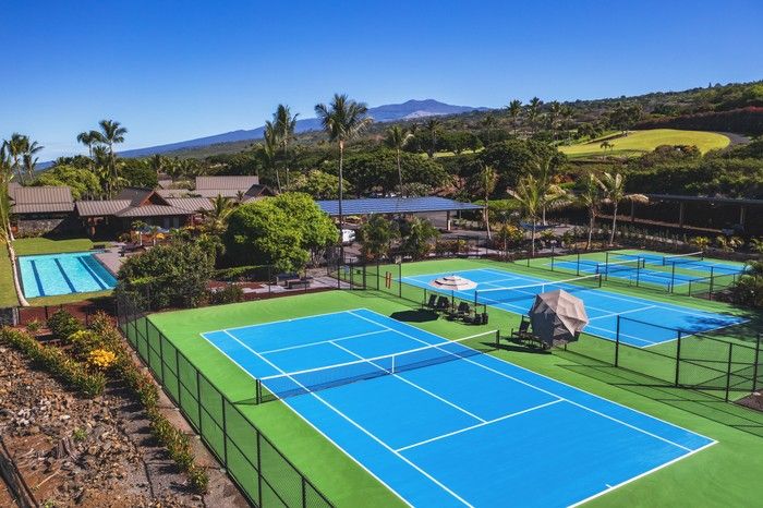 Membership at Hokulia includes a range of amenities such as a lush 18-hole golf course, a clubhouse and restaurant, a three-lane lap pool, bocci ball, tennis and pickleball courts.