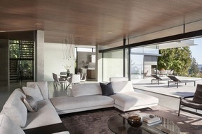 Low-profile furniture in soft shades keep focus on the view.