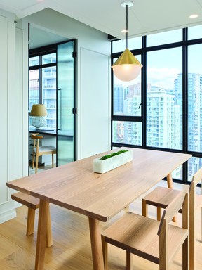 With access relocated off the home's dining room via full-height reeded glass doors, a second bedroom became a flex-office space with a Murphy bed to sleep guests.