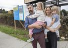 Strathcona resident Evan Horie with partner Holly Watts with their children Florence Watts, 5, and Effie Watts, 4, at the site of a proposed 38-story high-rise building that they fear will affect the liveability of their neighbourhood.