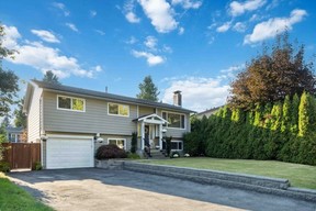 This detached house located at 3951 Victoria Place, in Port Coquitlam, was listed for $1,489,900 and sold for $1,480,000.