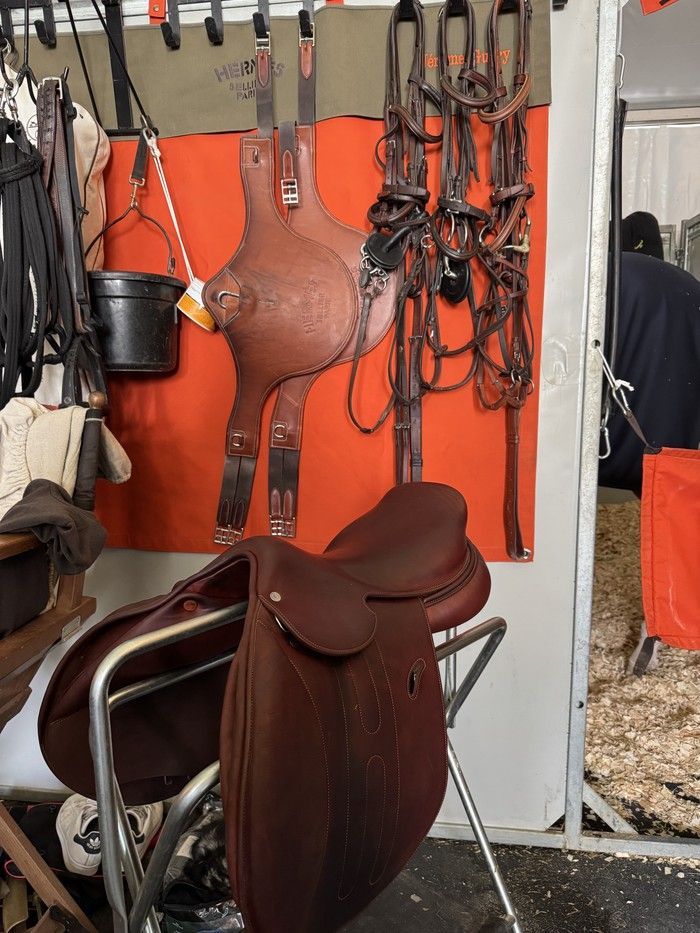  Tack, including saddles and girths, of a partner Hermès rider are pictured in the stalls outside the Saut Hermès competition in Paris.