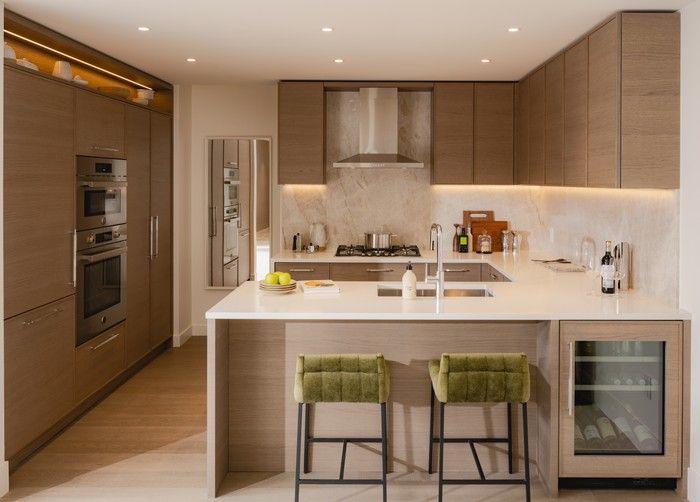  There is a focus on functionality in the large kitchens at the Rockford, such as the pullout unit to maximize corner cabinets, convenient electrical outlets and cutlery organizers.