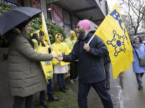 Federal NDP leader Jagmeet Singh on the picket line with striking Life Labs workers in Vancouver on Tuesday.